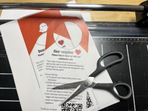 An image of a door hanger that shares some information for neighbors that you have already learned on this page, and invites them to learn more.